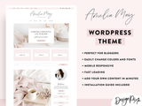 Amelia May WordPress theme with website layout and features on a light pink background